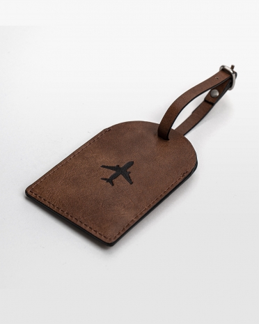Brun bagagemærke i kunstlæder