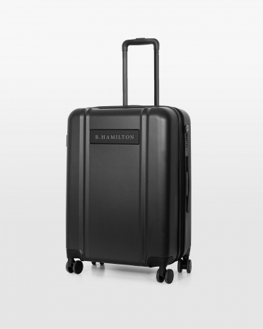 Mørkegrå kuffert med navn og sorte detaljer