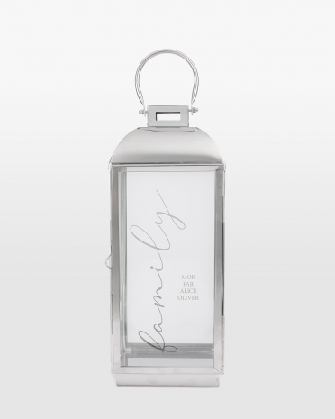 Sølvfarvet lanterne med navn