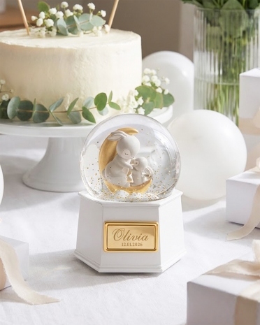 Snekuglelampe der drejer og spiller en melodi, med personligt navn og dato