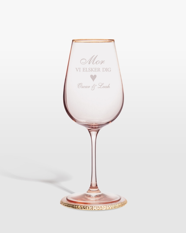 Lyserødt vinglas med personlig gravering og glasbrikker