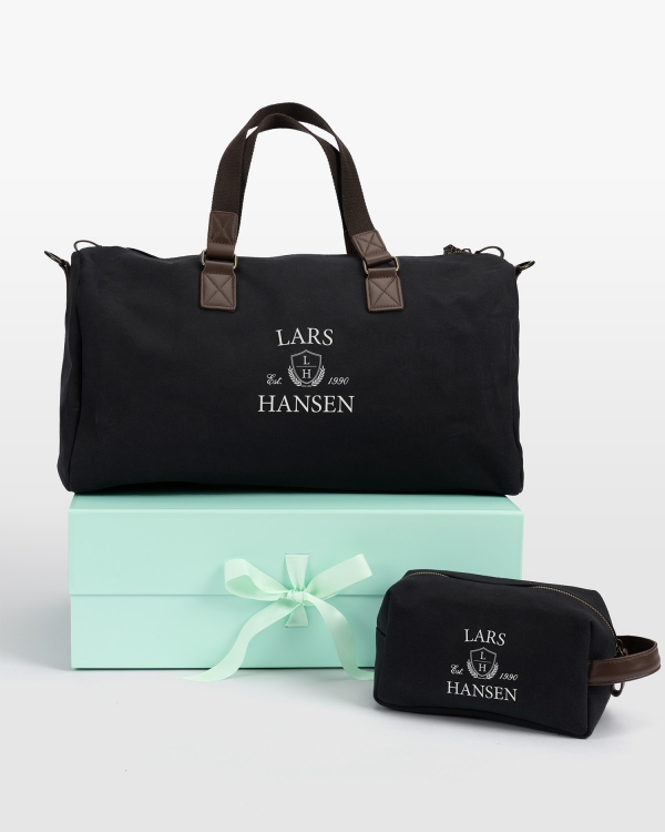 Sæt med duffelbag og toilettaske med navn
