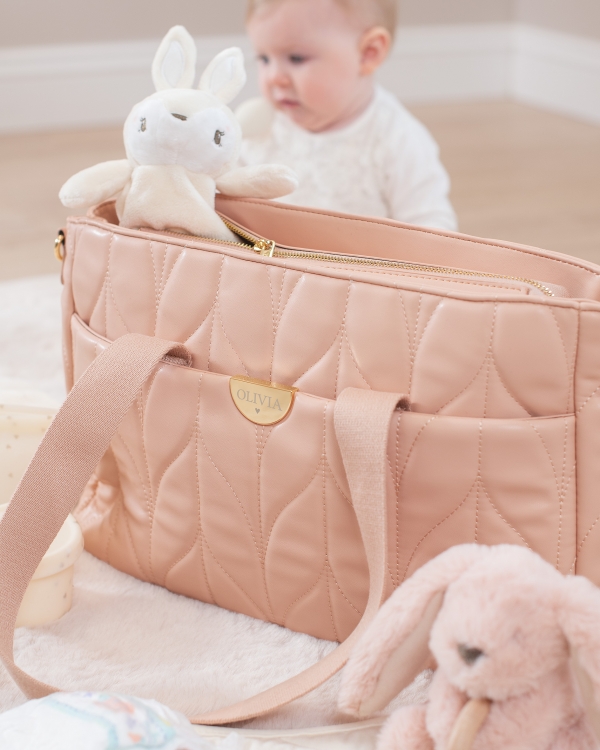 Lyserød skiftetaske med navn